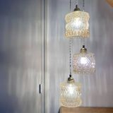 Triple antique globe pendant light in amber glass