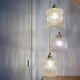 Triple antique globe pendant light in amber glass