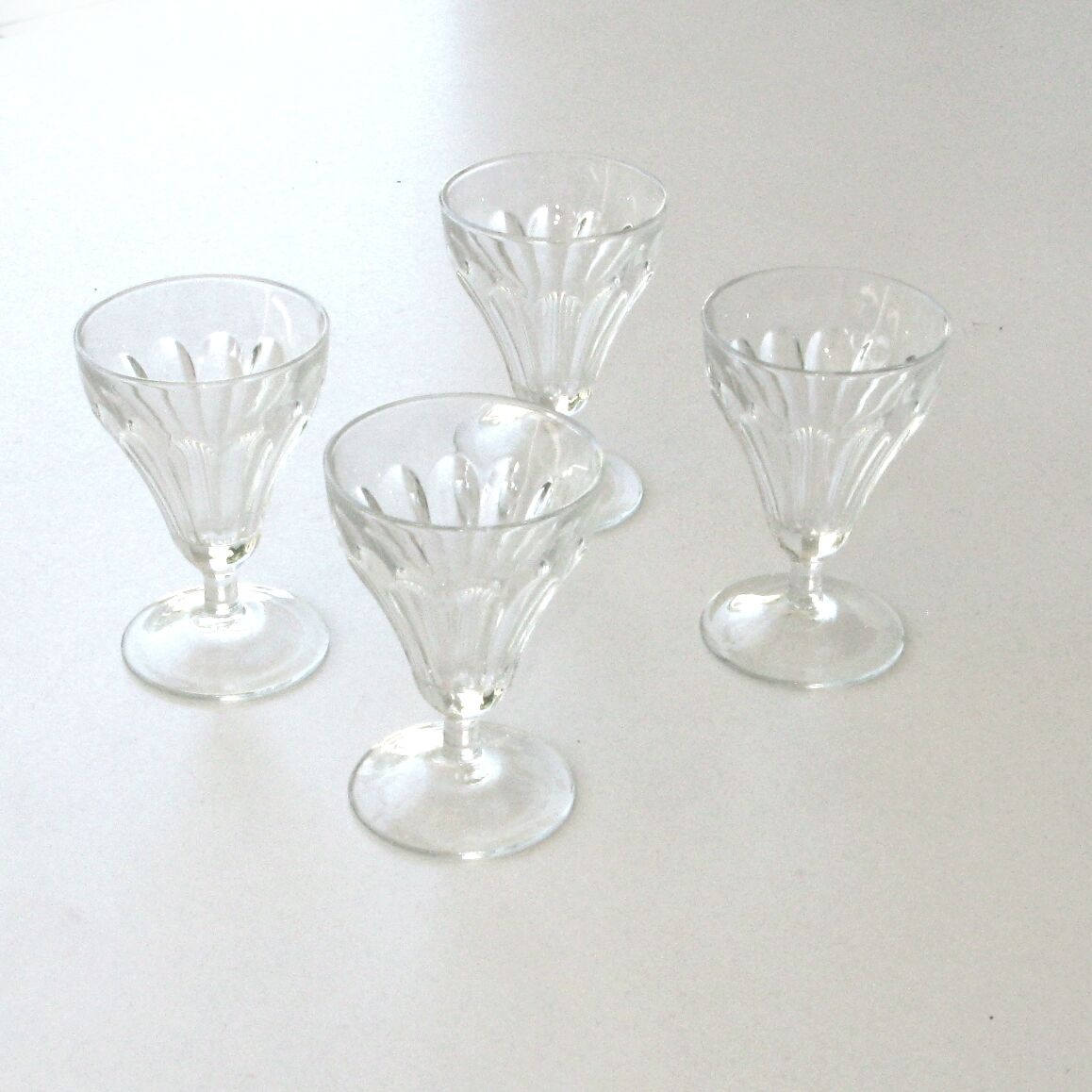 4 old foot glasses for cooked wine