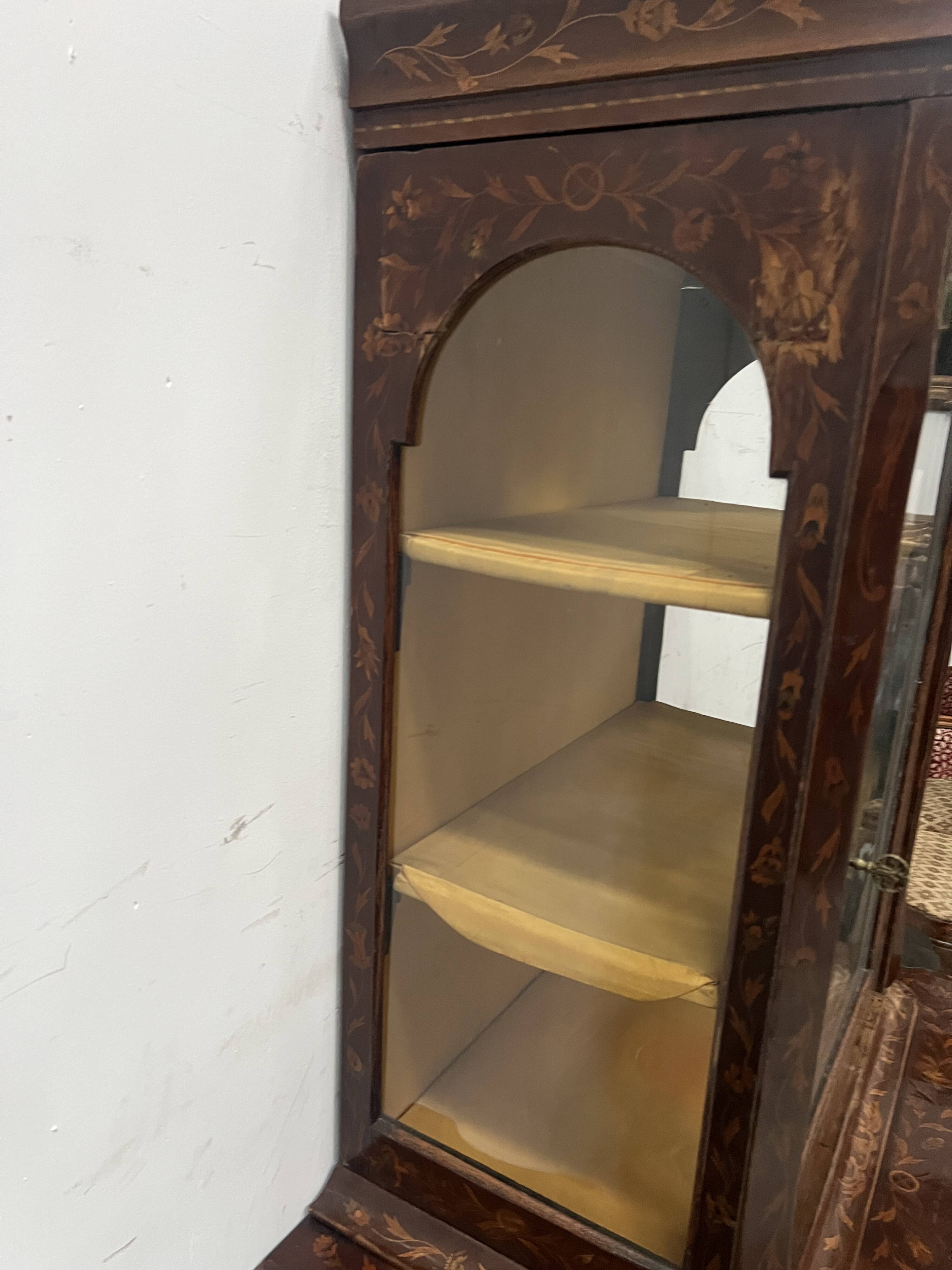 Dutch display cabinet in two parts made of marquetry wood.