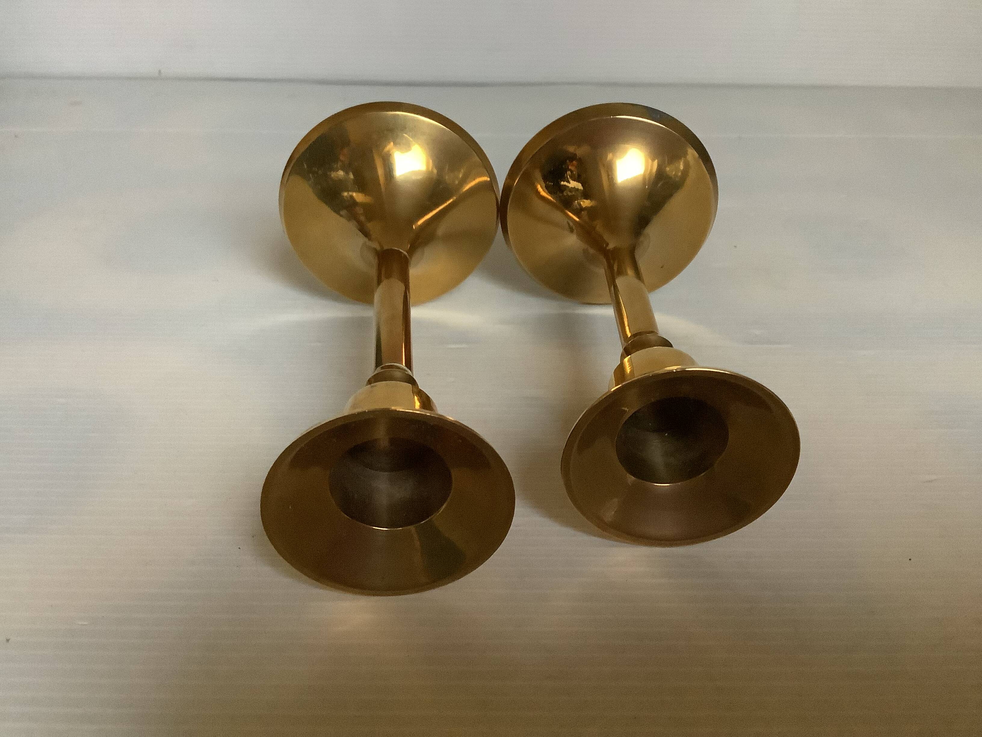 Pair of small brass tulip-shaped candlesticks