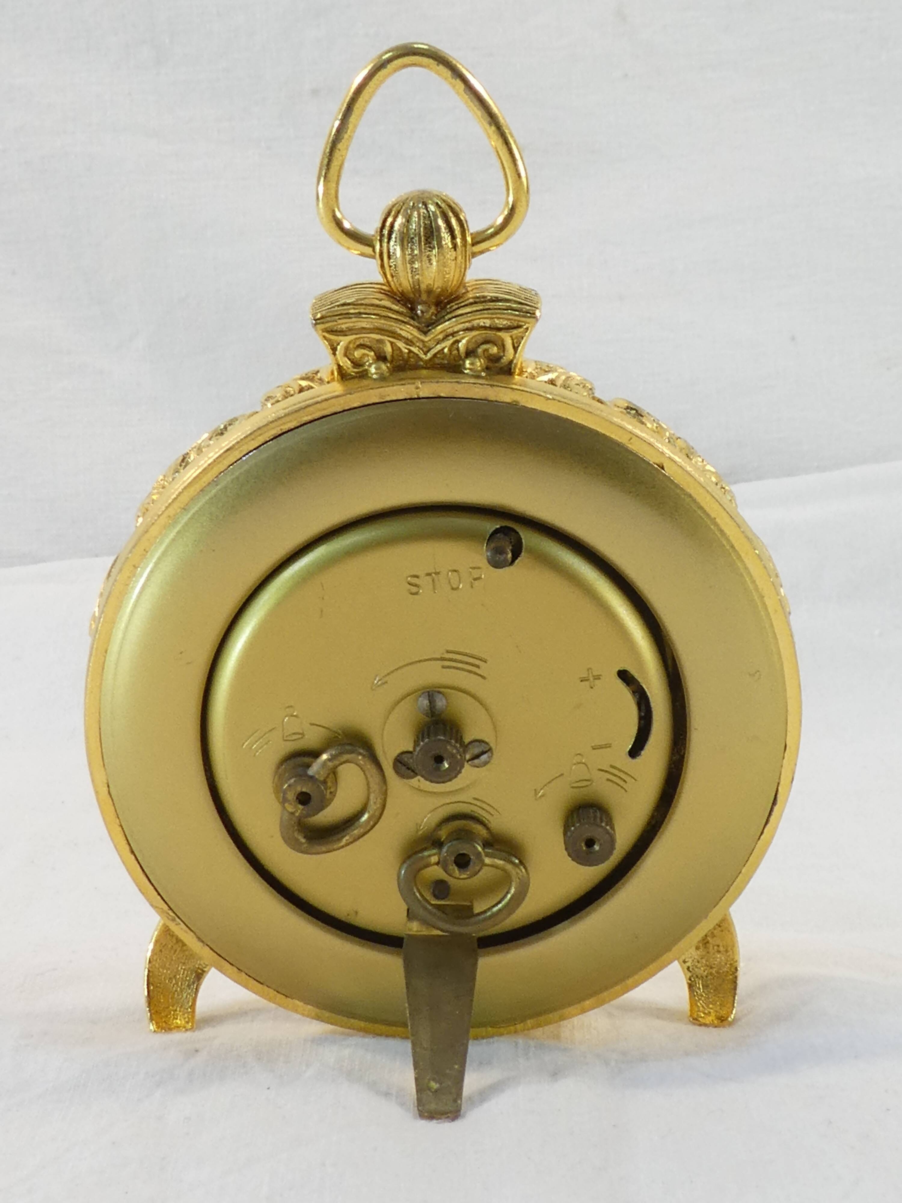 LANCEL alarm clock in chiseled bronze and gilded metal