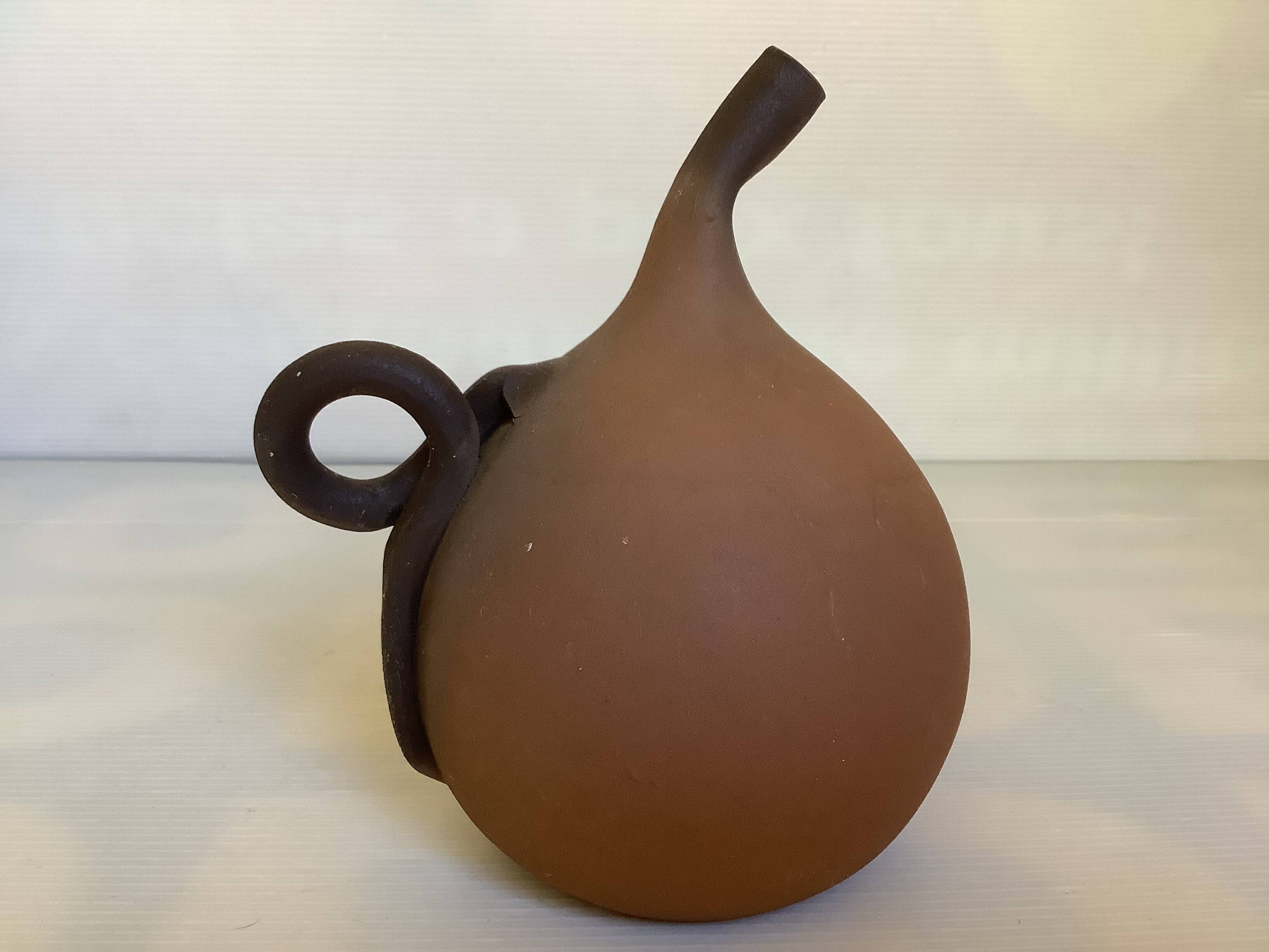 Signed terracotta vase