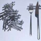 Twelve 70s design metal knife holders