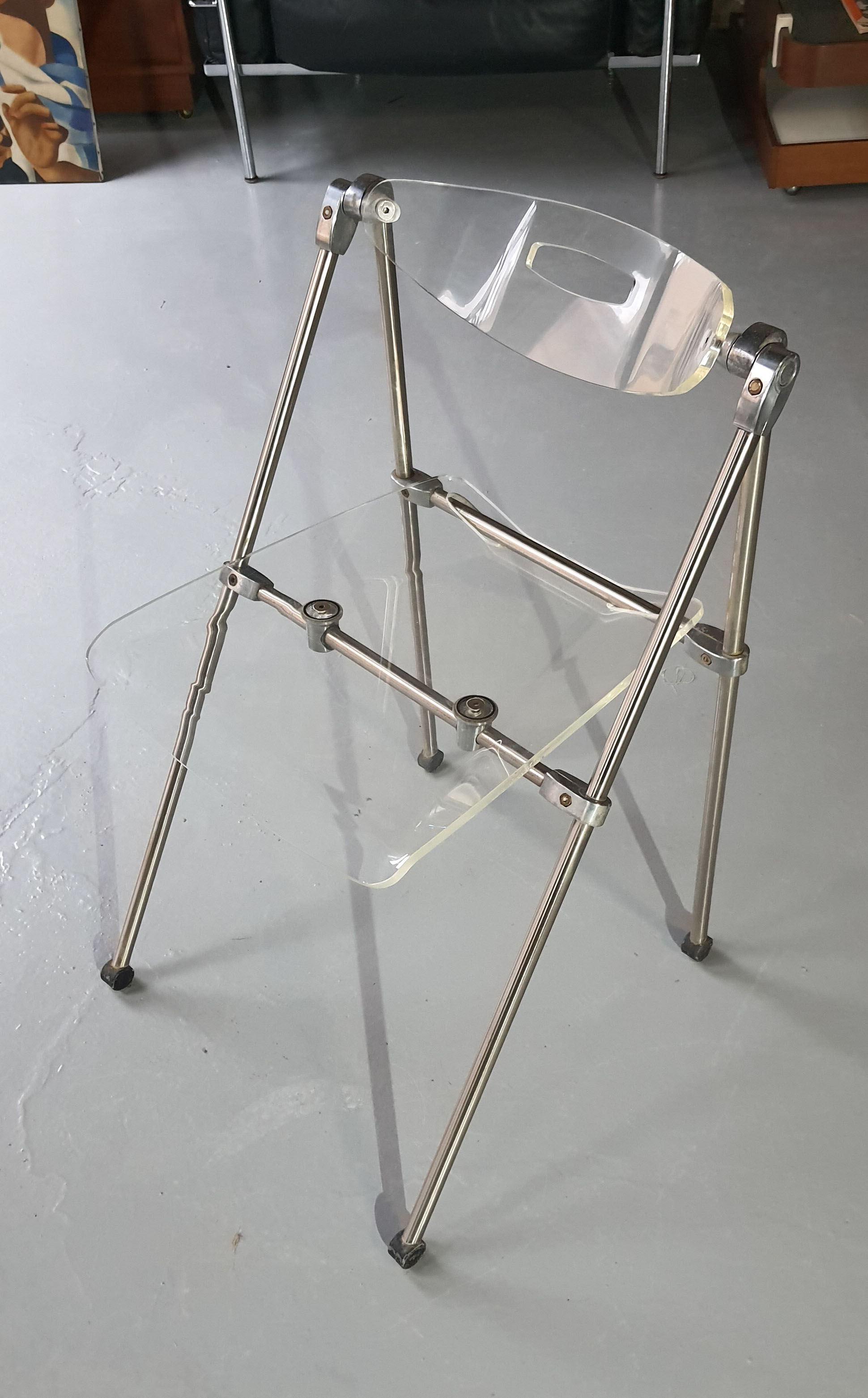 Modern folding chair in plexiglass Giancarlo Piretti - EDA Concept