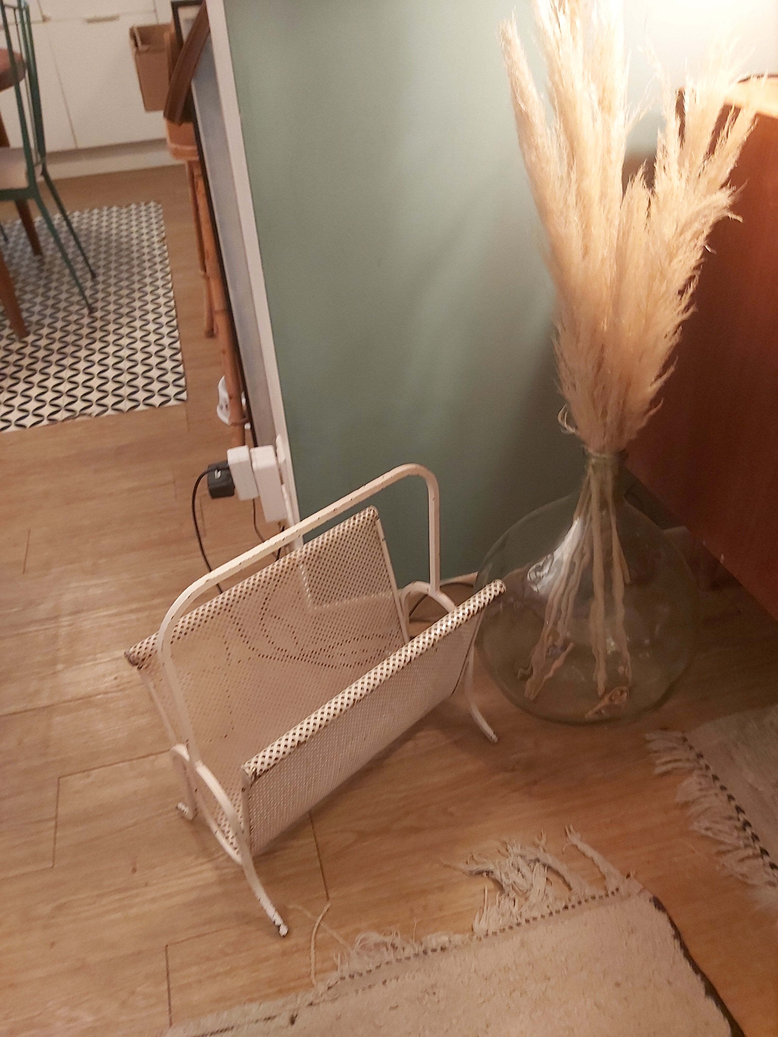 Vintage perforated metal magazine holder