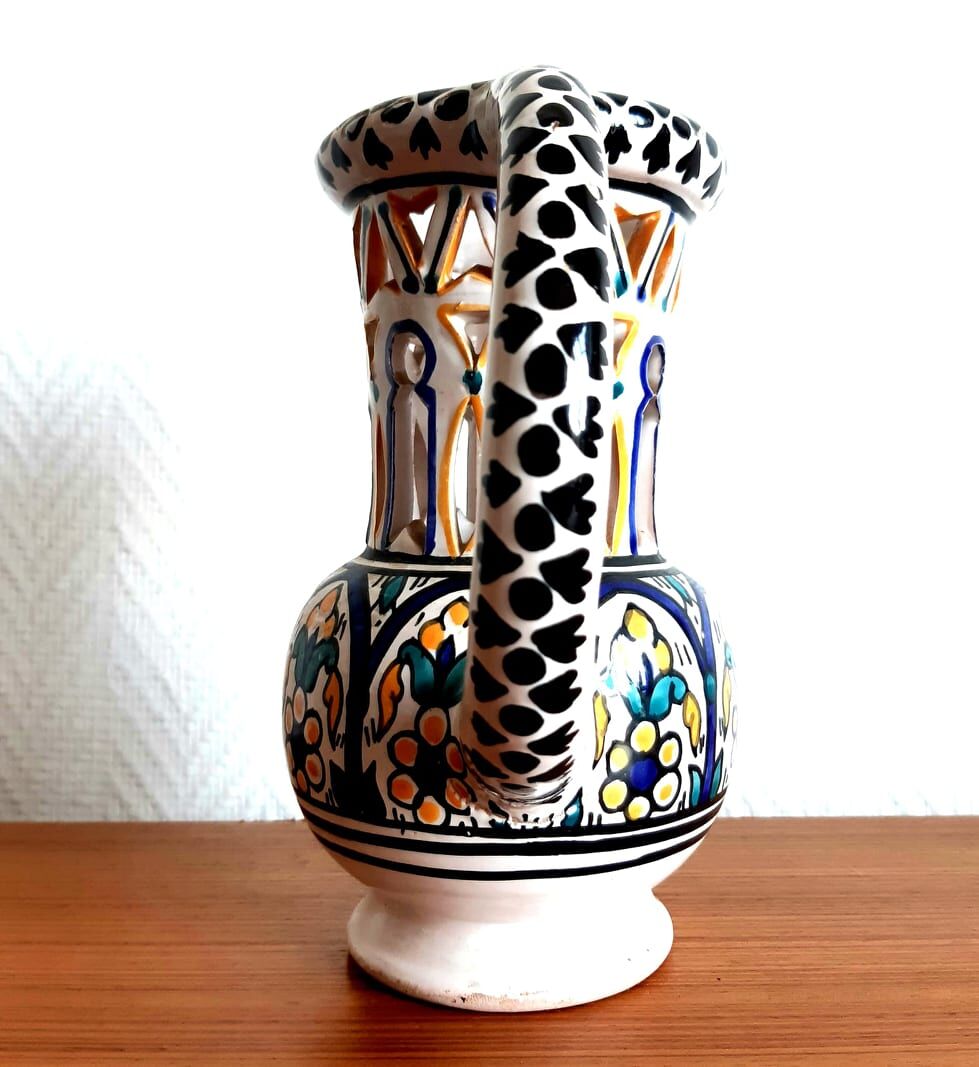 Deceptive pitcher in glazed earthenware