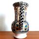 Deceptive pitcher in glazed earthenware