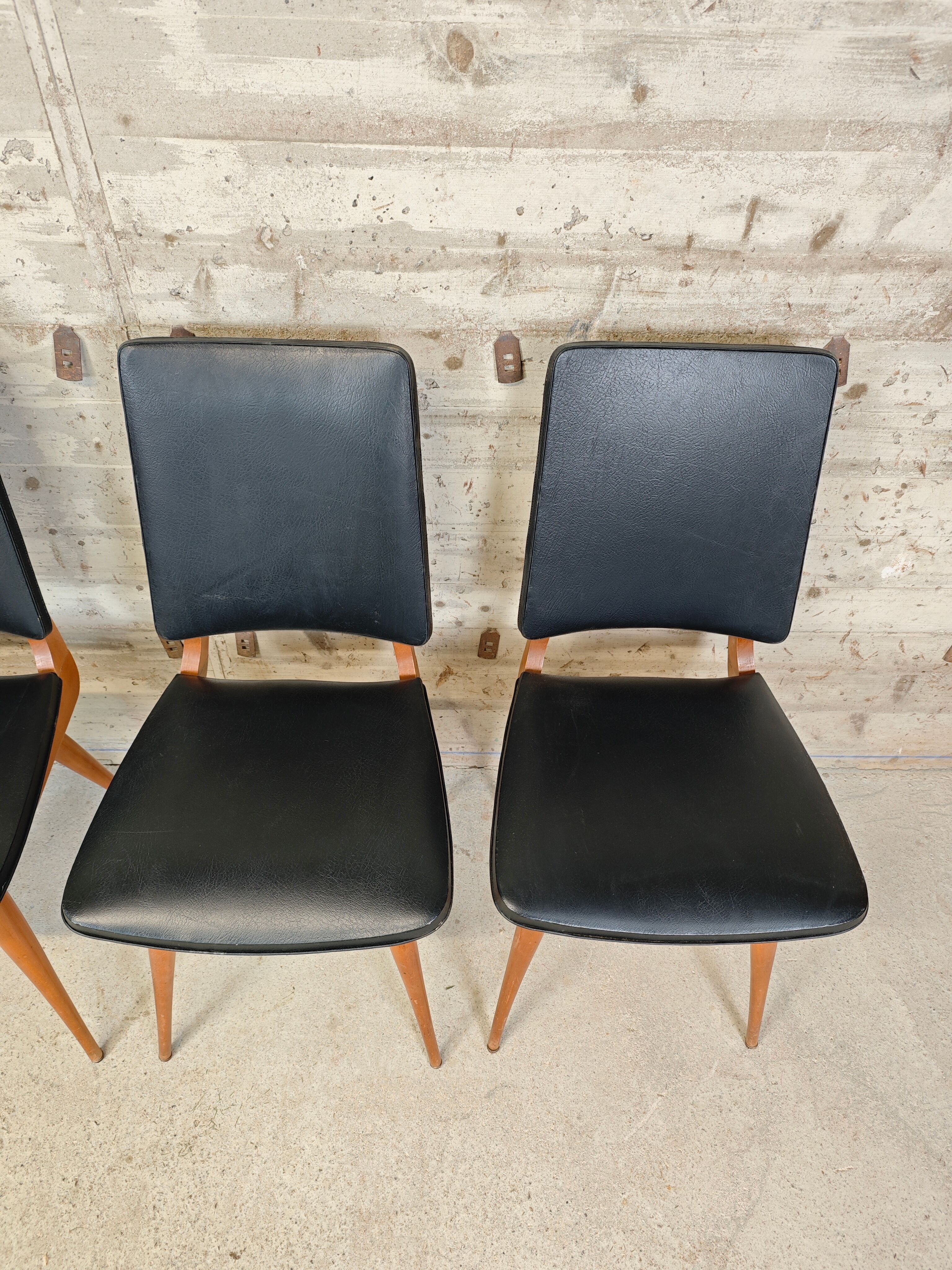 Set of 4 vintage chairs with tapered legs.