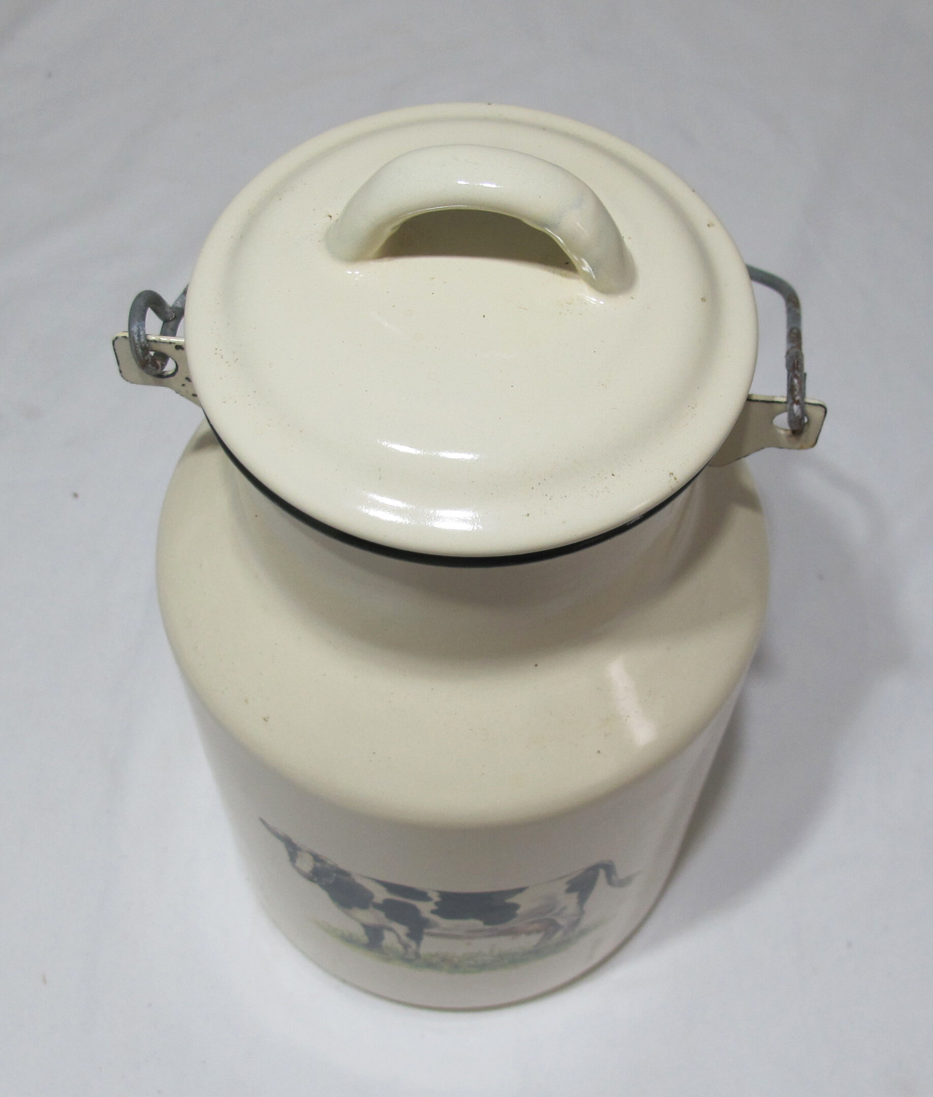 Milk jug in vintage enamelled sheet metal