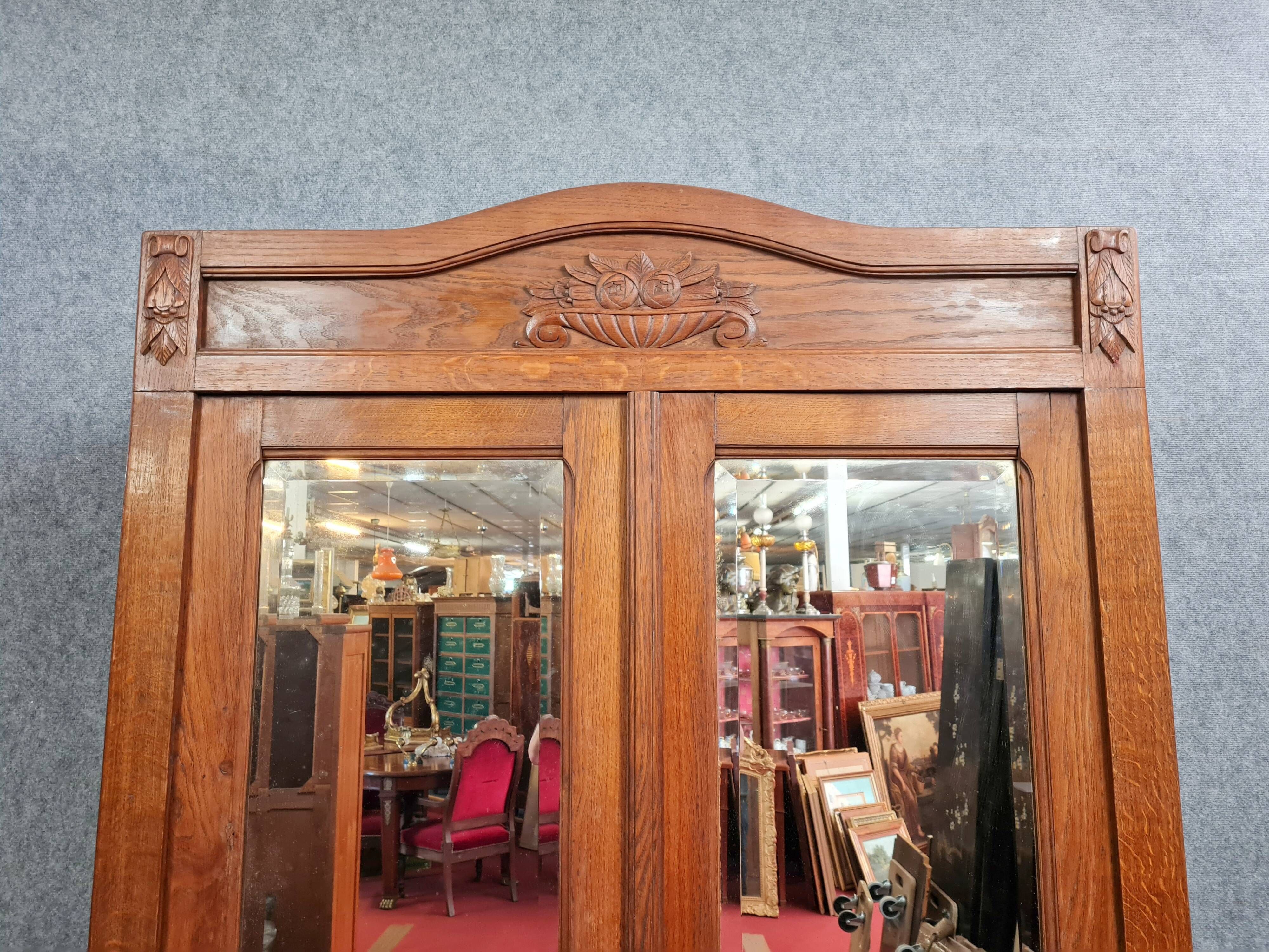 Art Deco period library cabinet in solid oak with honey patina circa 1925
