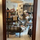 Beveled mirror with wooden contours