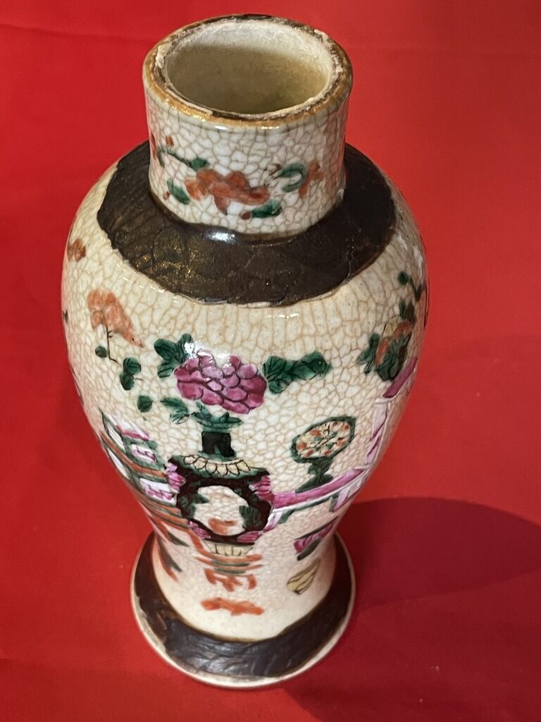 Ancient Asian porcelain vase