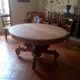 Large antique table in solid oak with a superb carved base.