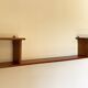 Varnished wooden wall shelf, 1960s