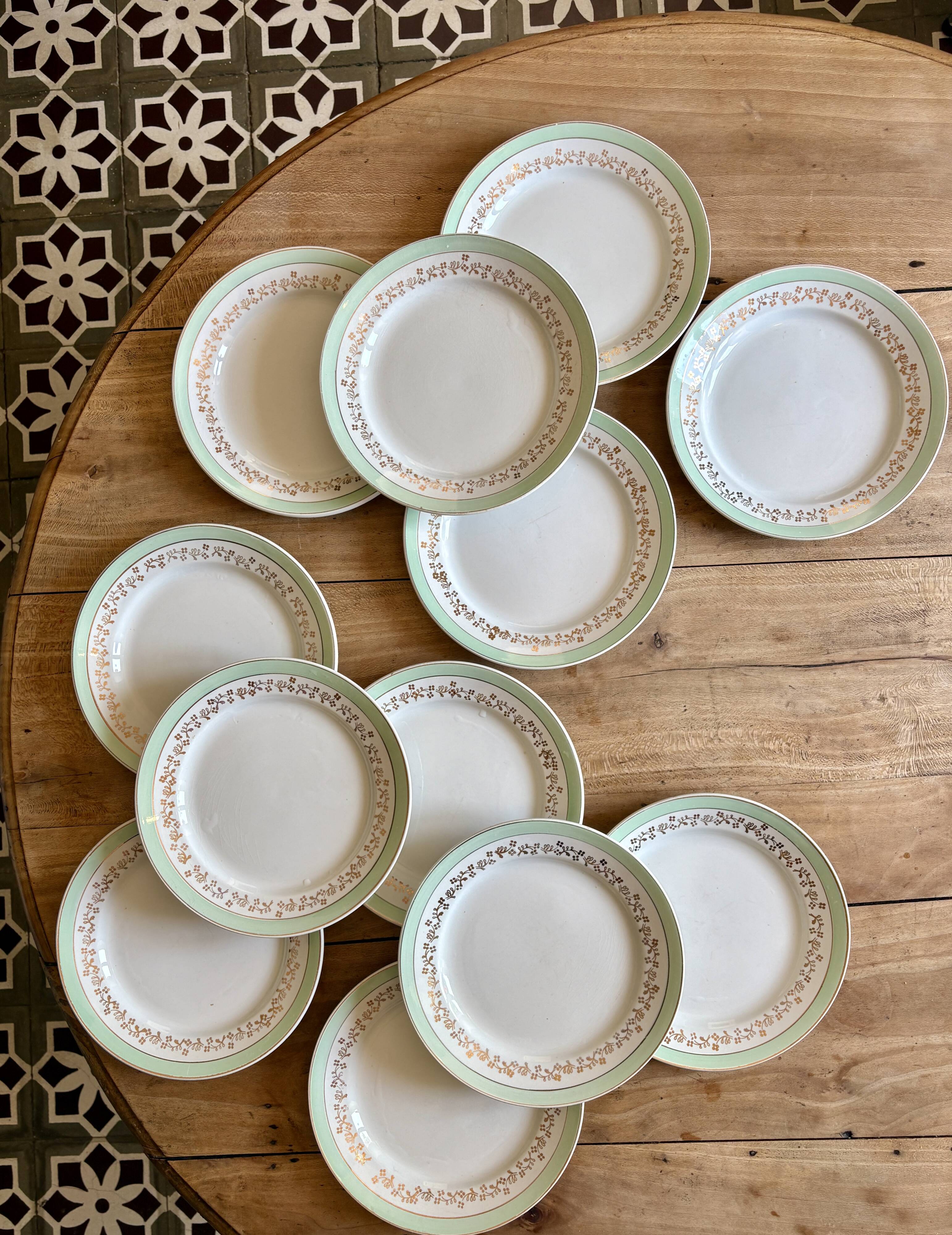 Set of 12 white, mint and gold flat plates, Mosèle de Lunéville