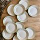Set of 12 white, mint and gold flat plates, Mosèle de Lunéville