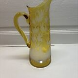 Decorated yellow glass pitcher
