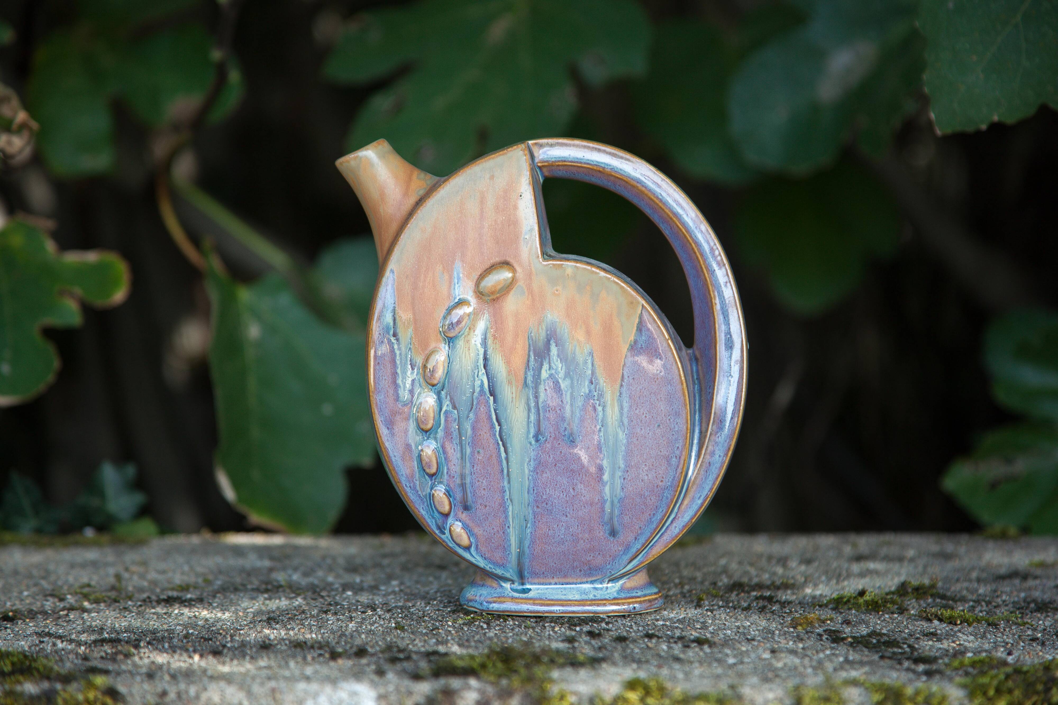 Flamed enameled stoneware bottle, pitcher, liquor bottle signed Denbac number 610, art vase