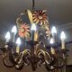 Set of painted metal chandeliers with flower decor