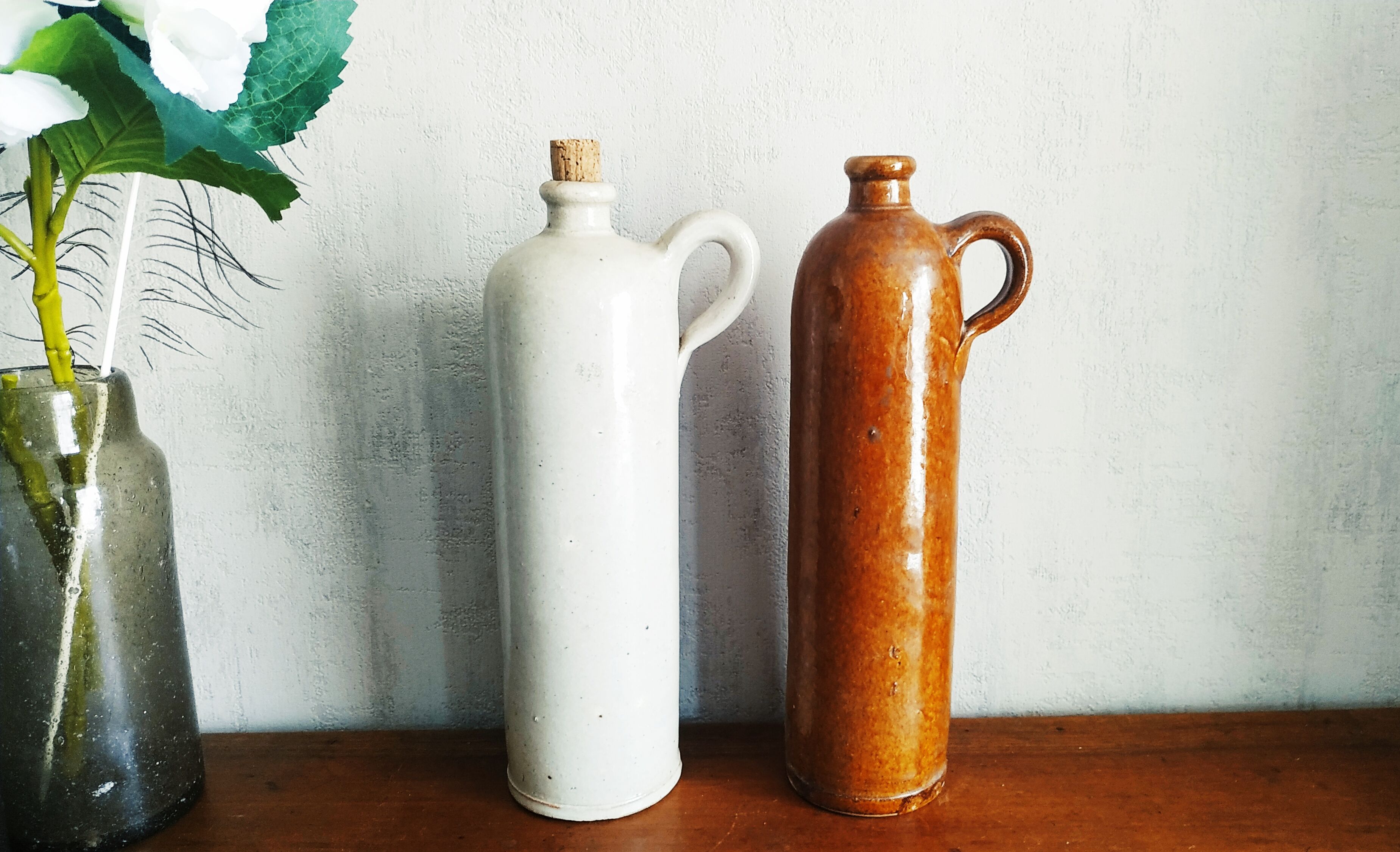 Pairs of sandstone jugs