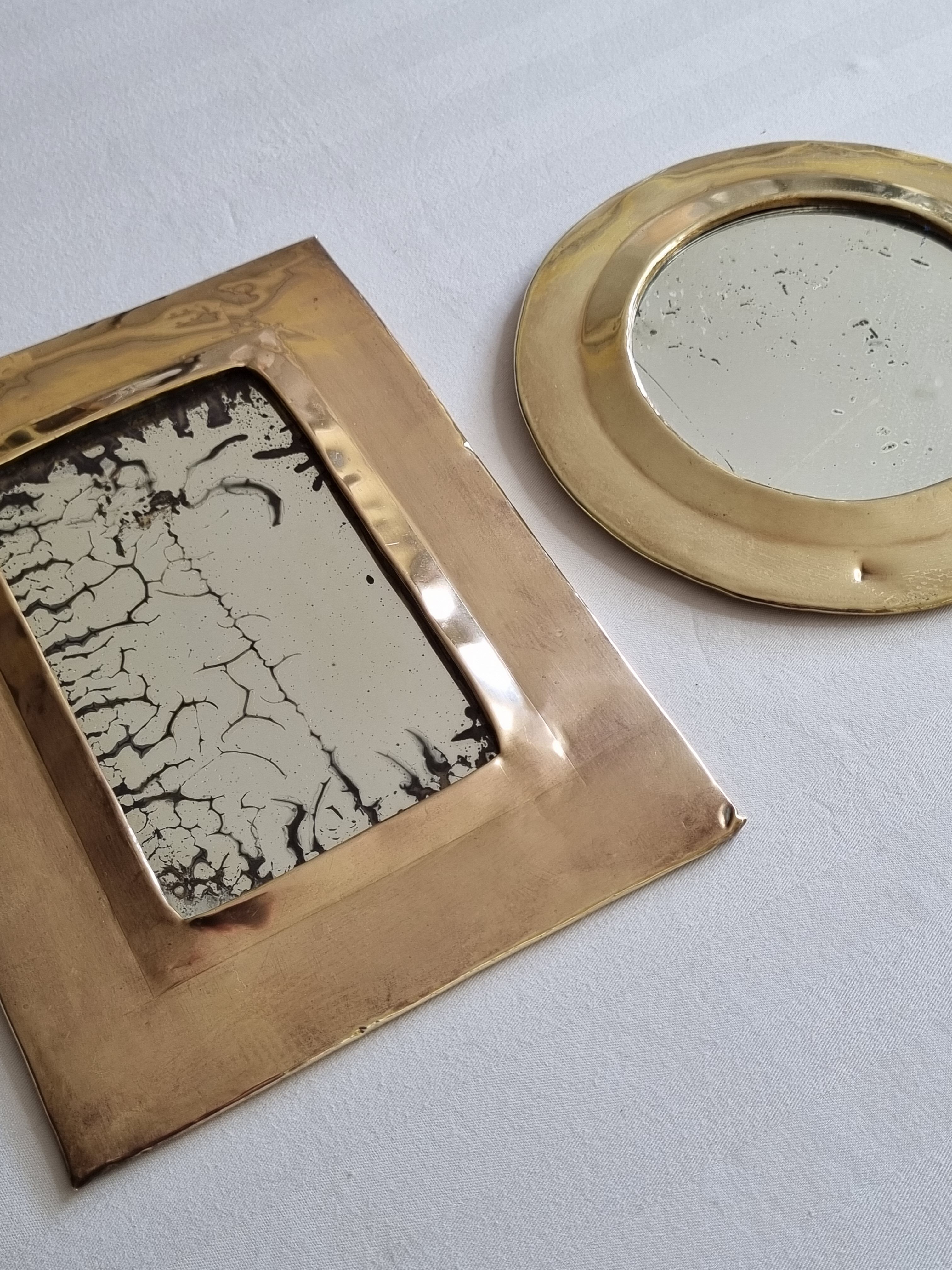 Set of two old Moroccan brass mirrors, 22 cm