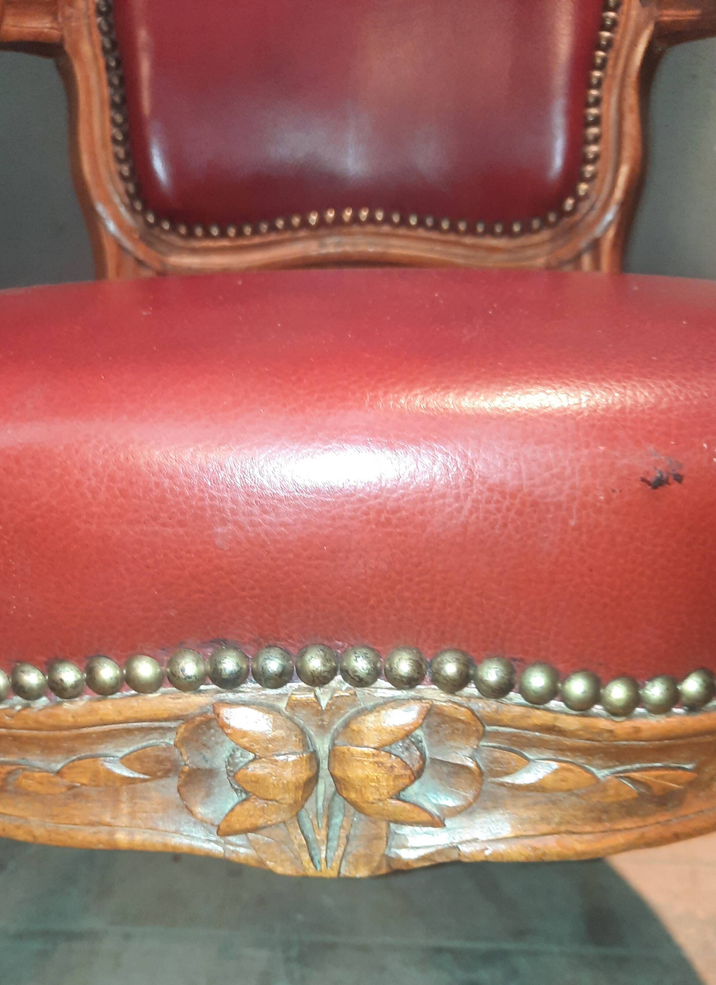 Louis XV period armchair covered in leather.