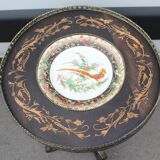 Small round ebonized round table with pretty chna plate ,