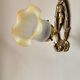 Antique wall light in gilded brass and glass tulip