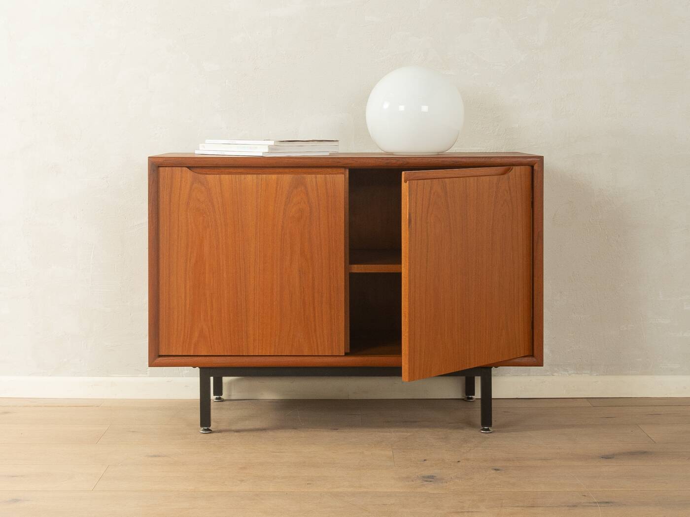 Classic chest of drawers from the 1960s with practical, closed storage space