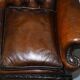 Chesterfield leather canapé in Georgian style with lion paw carved feet.