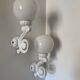 Cast iron and opaline wall lights from the 70s