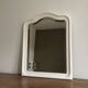 Antique mirror with a gendarme hat shape. White. 72x56.