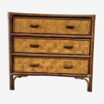 Chest of drawers made of wood, rattan and bamboo.