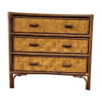 Chest of drawers made of wood, rattan and bamboo.