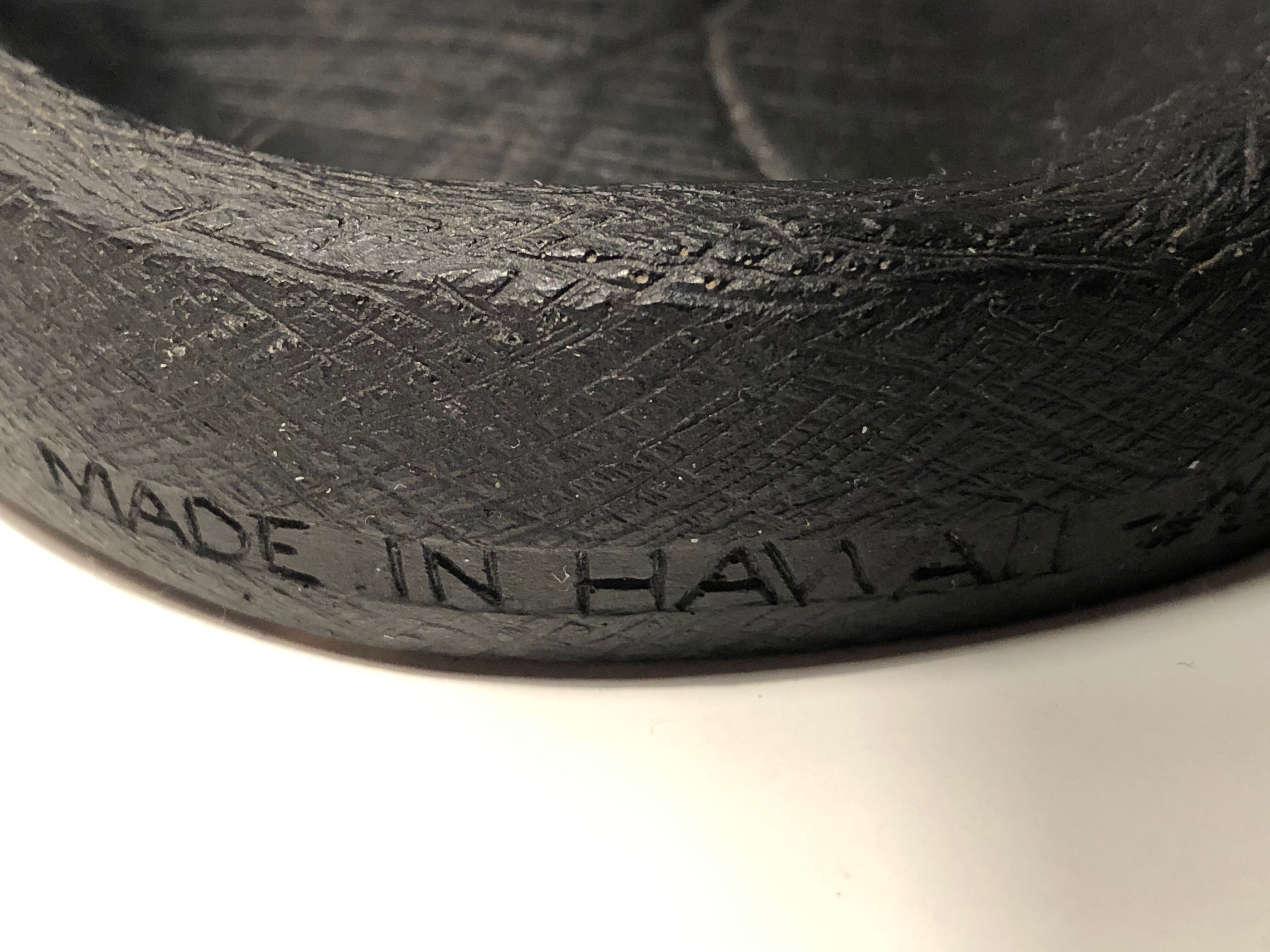 Empty pocket in Hawaiian lava in the shape of a hand signed Coco Joe, 1960