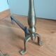 Brass or bronze andirons