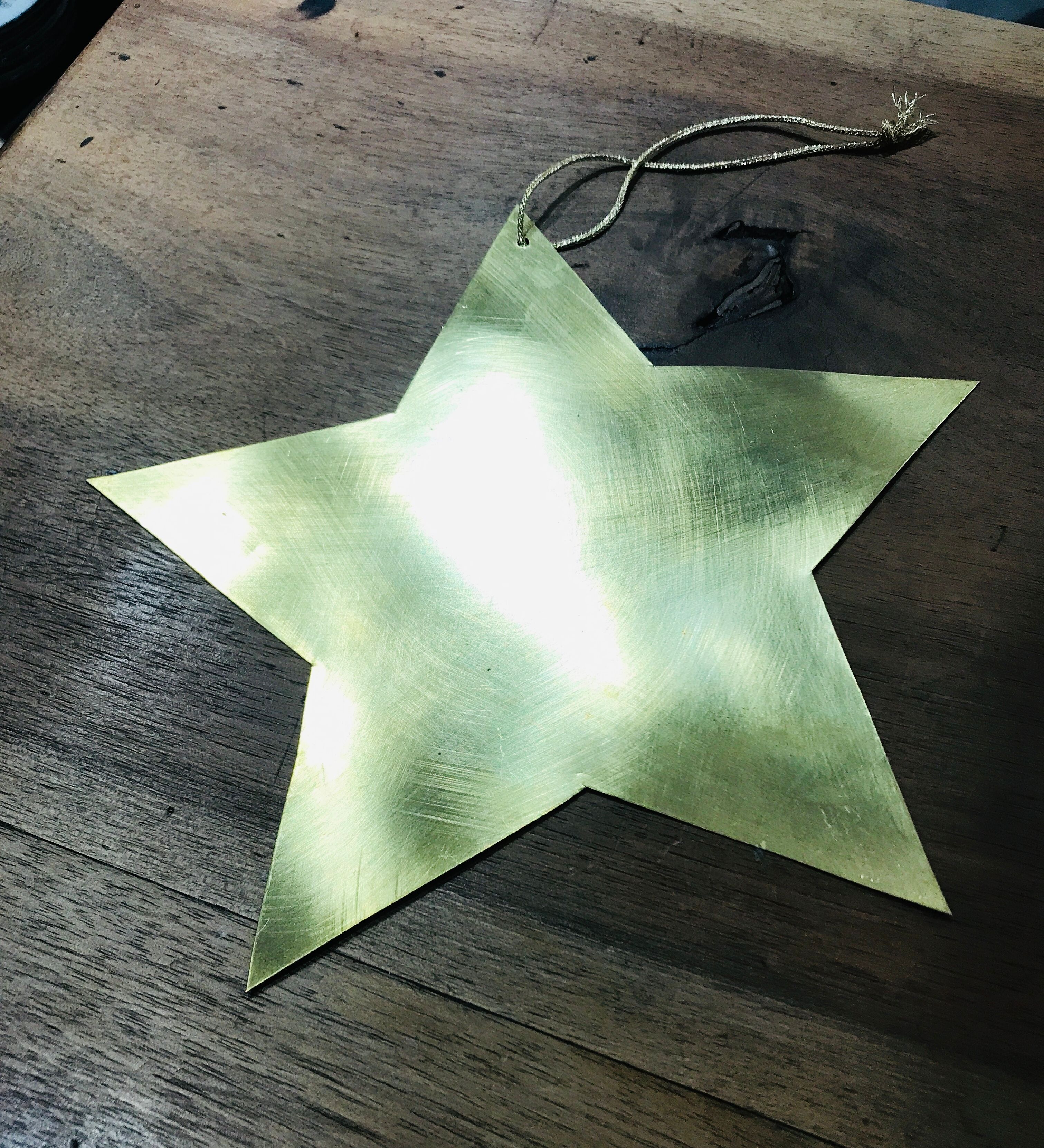Golden brass star