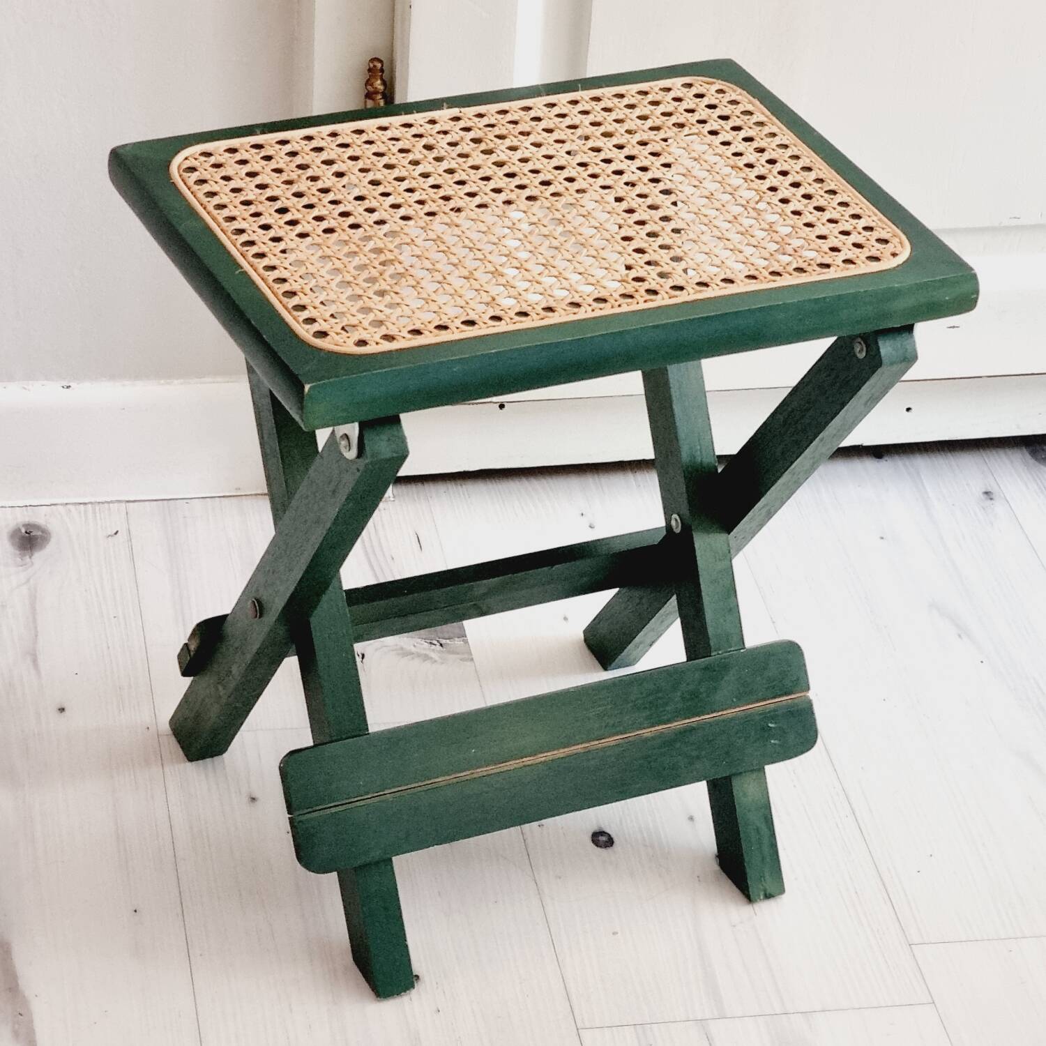 Small folding stool in green wood and cane