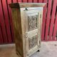 India. Bonnetière with a teak door finely carved by hand.