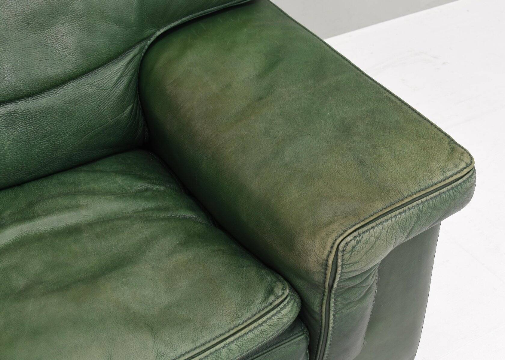 Roche Bobois lounge armchair in original green patinated leather, 1970