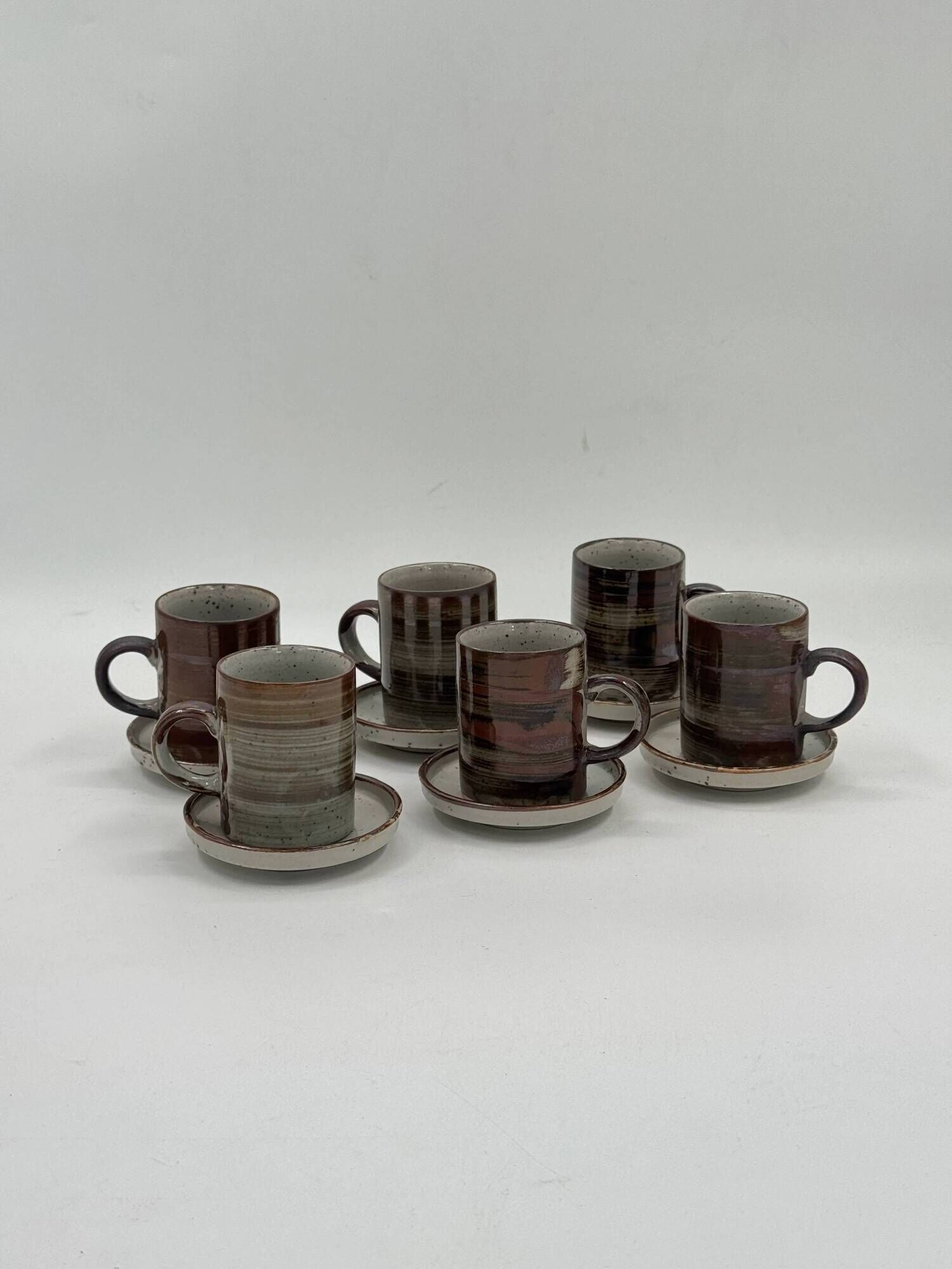 Set of 6 vintage handmade stoneware cups and saucers.