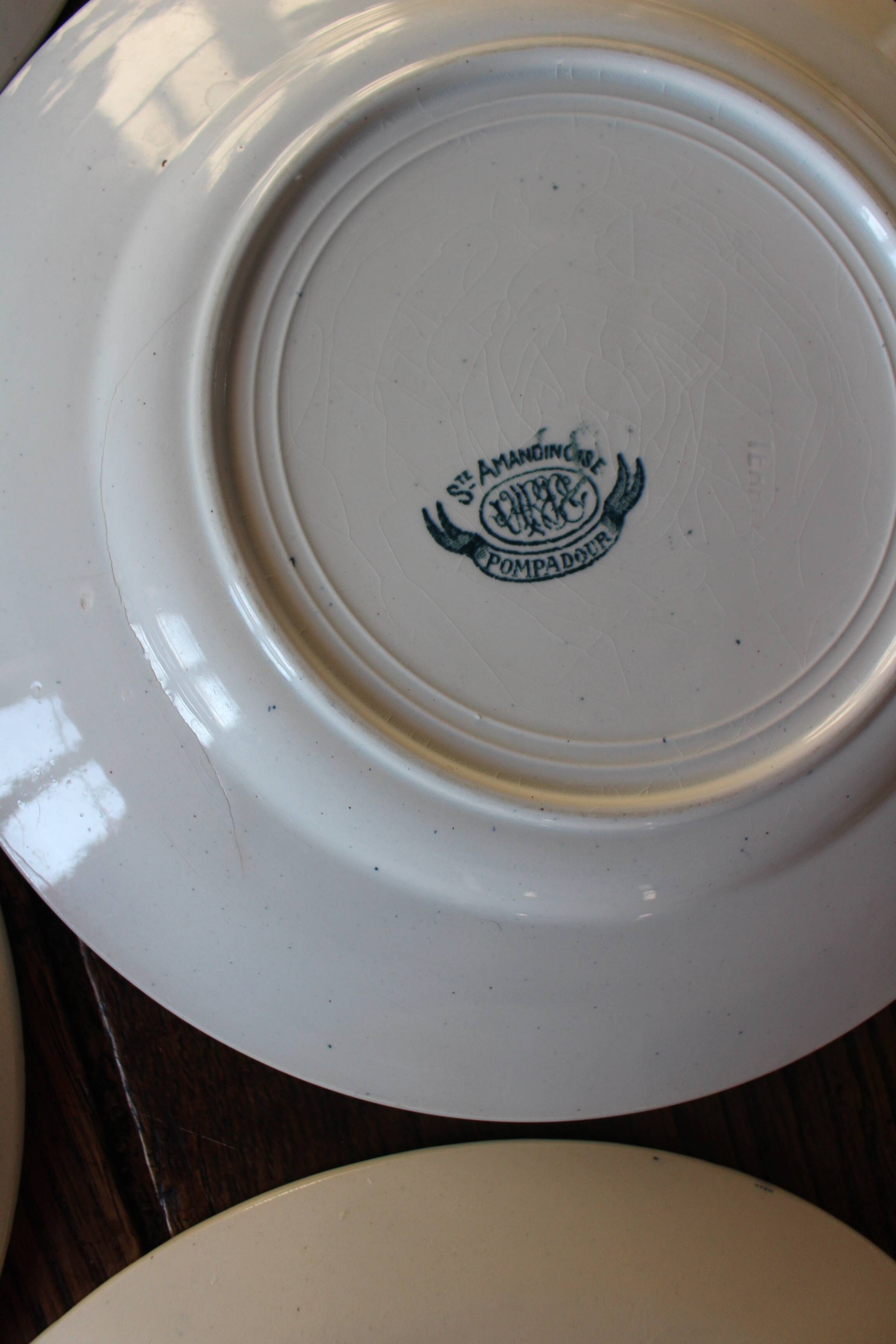 A set of 4 flat plates Terre de fer mismatched blue
