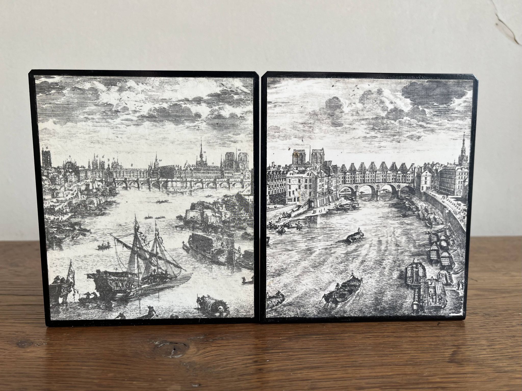 Bookends 1960 between Fornasetti's grey and Toile de Jouy views of Paris.