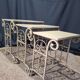 Nesting tables in patinated iron.