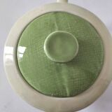 Two sugar bowls and a textured plate in turquoise and green Salins earthenware.