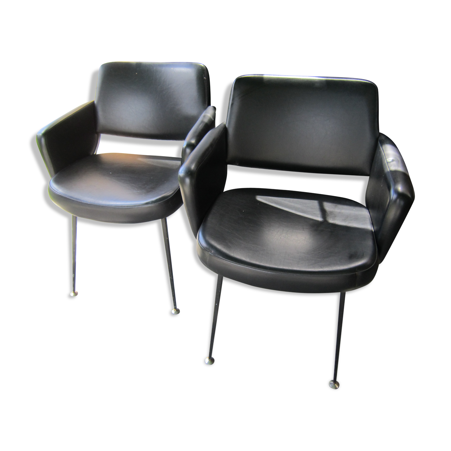 2 armchairs in 1972 black leatherette