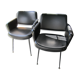 2 armchairs in 1972 black leatherette