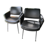 2 armchairs in 1972 black leatherette