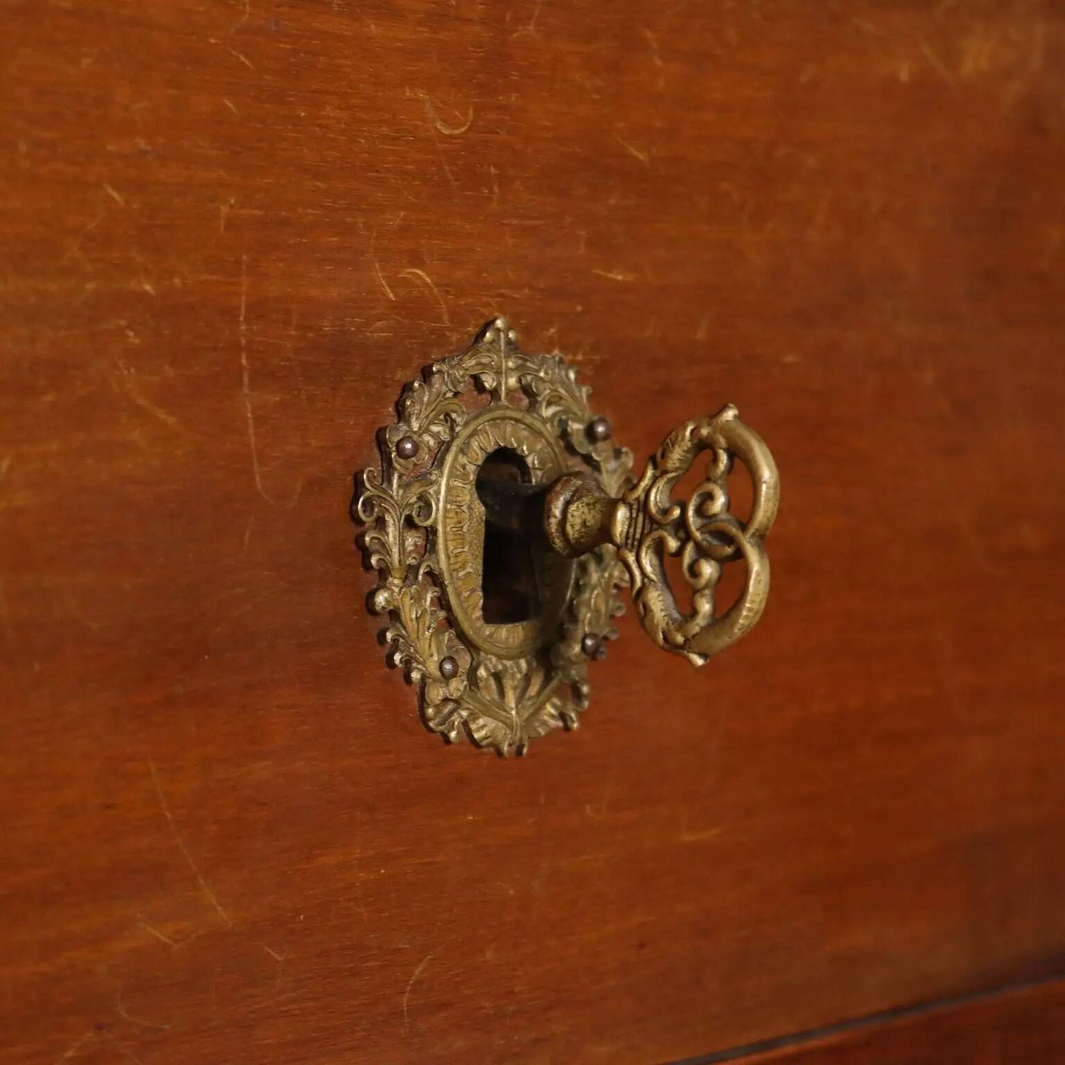 Antique Empire walnut and marble commode, 19th century.